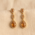 Amber: The Champagne Triple Pave Teardrop Drop