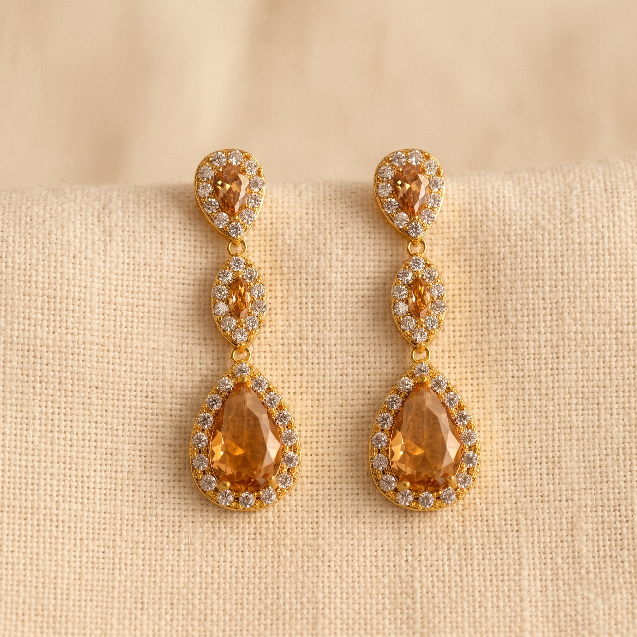 Amber: The Champagne Triple Pave Teardrop Drop