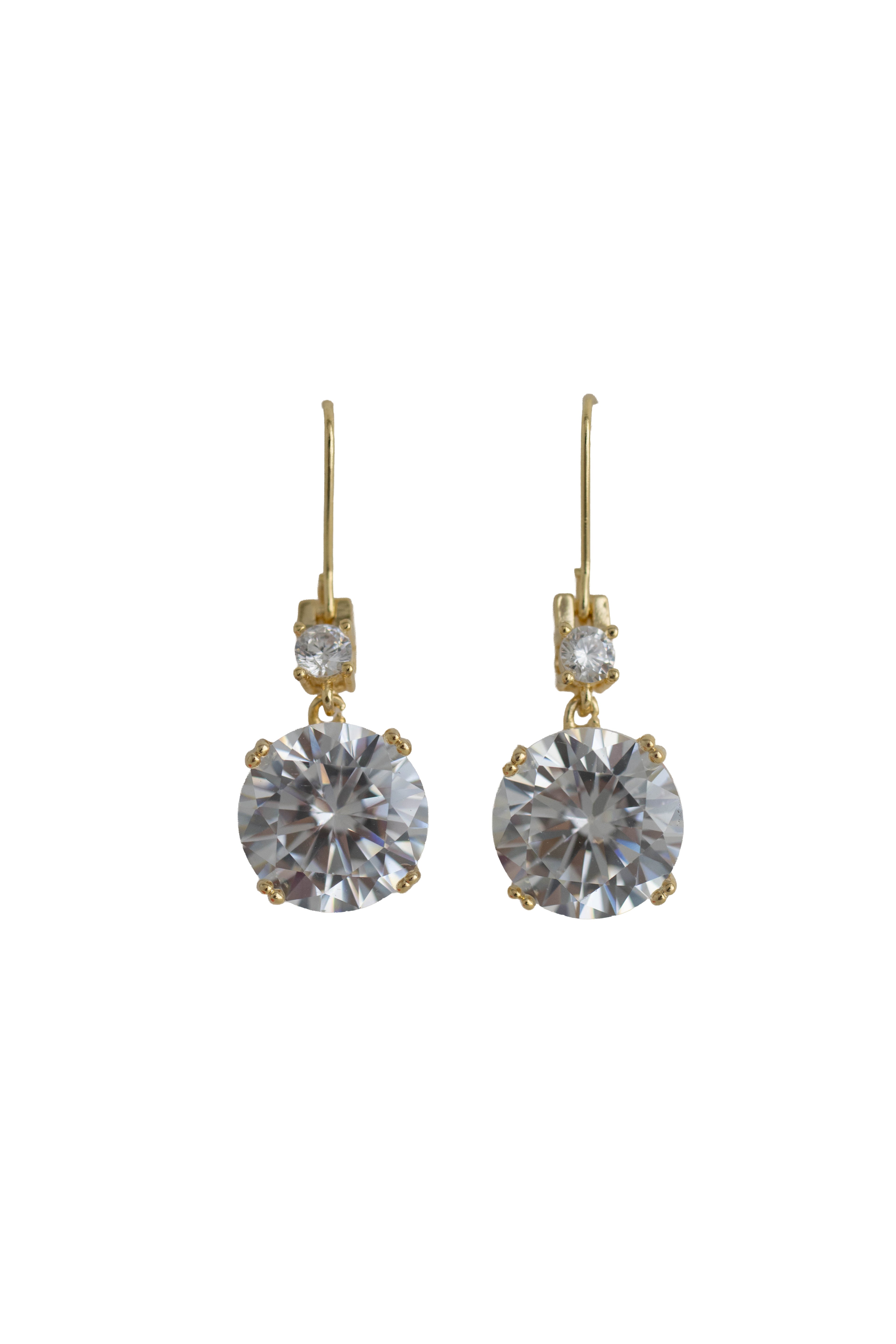 Gold earrings with large clear gemstones