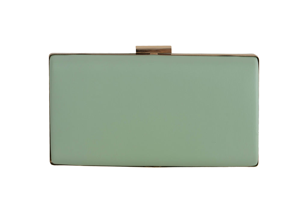 Mint green clutch bag on a white background