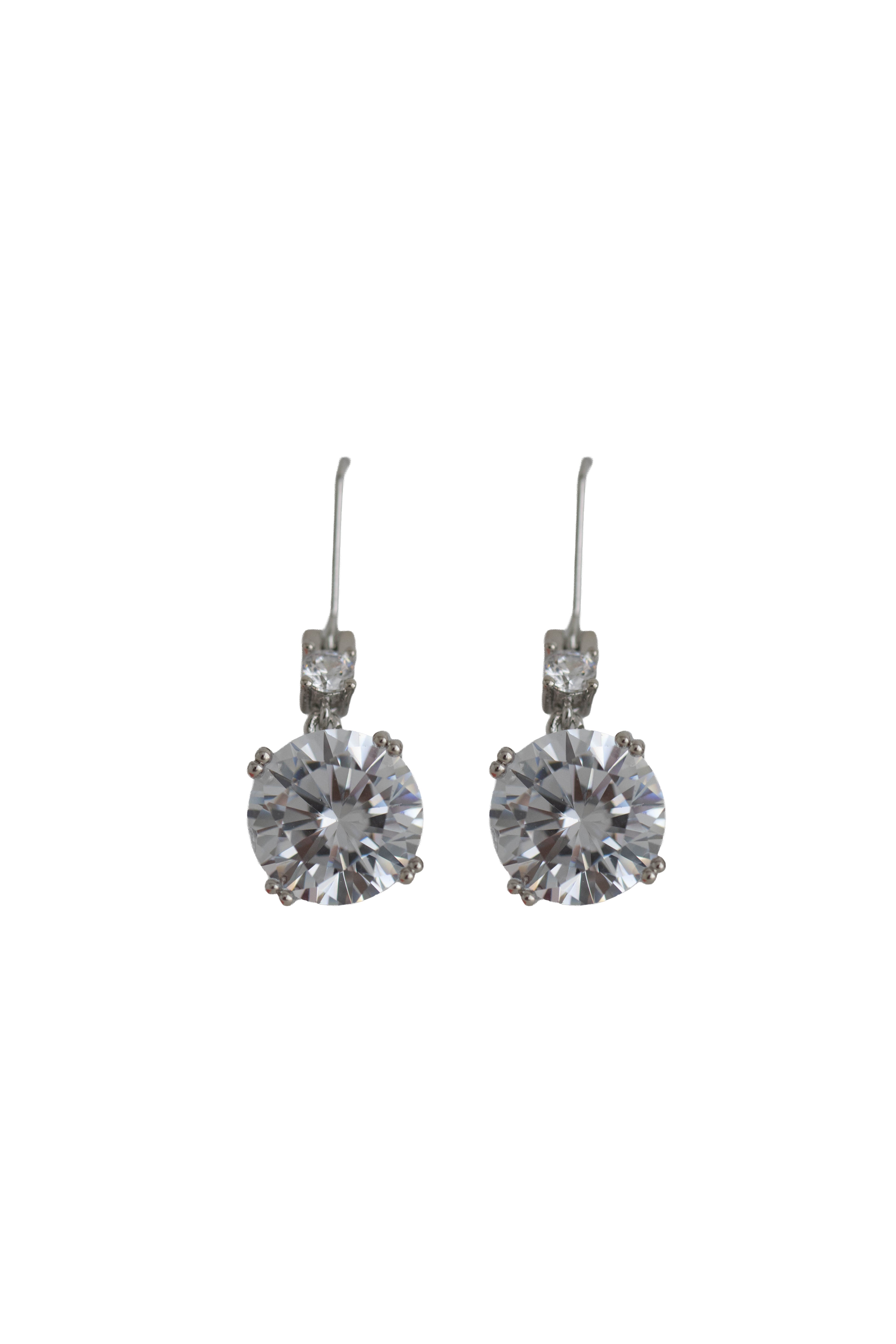 Pair of silver earrings with large clear gemstones