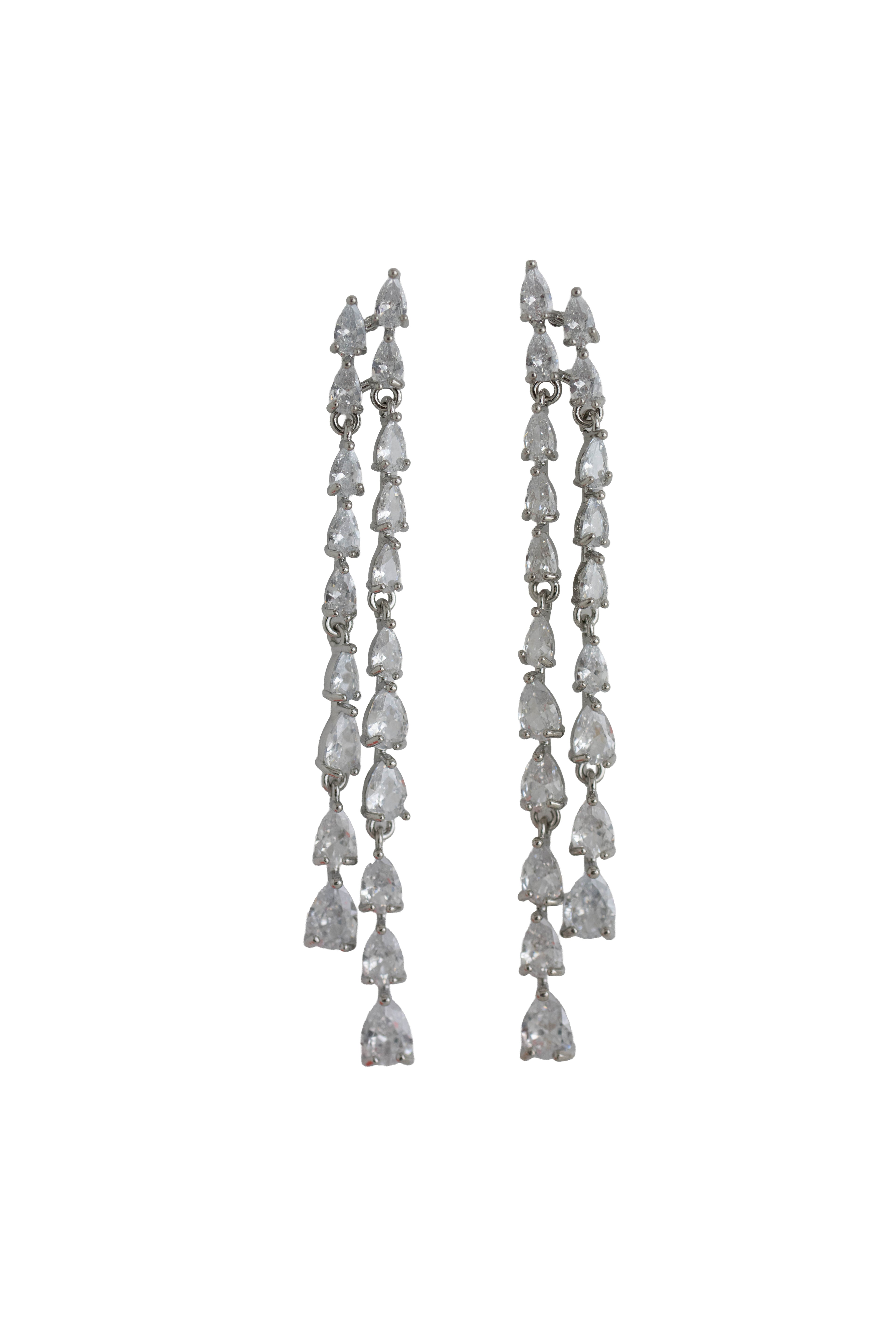 silver fringe earrings featuring two long strands of sparkling teardrop crystals